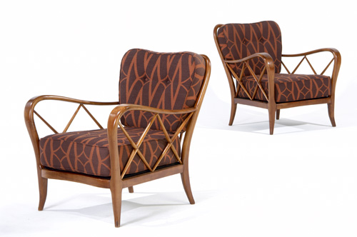 Appraisal: GUGLIERMO ULRICH Pair of sculpted walnut armchairs with fabric-upholstered cushions