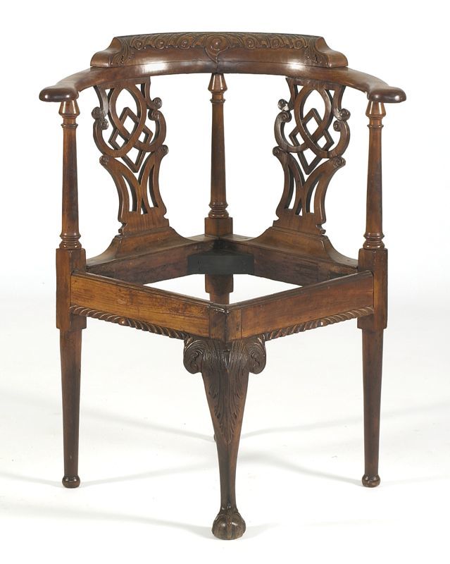 Appraisal: ANTIQUE AMERICAN CHIPPENDALE CORNER CHAIR In cherry with carved crest