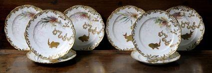 Appraisal: EIGHT ENGLISH GILT AND POLYCHROME PORCELAIN FISH PLATES Each plate