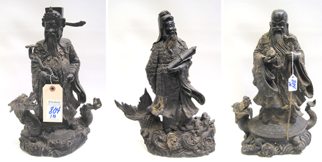 Appraisal: THREE ASIAN BRONZES having dark brown patination with traces of