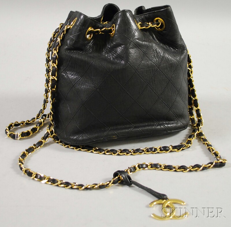 Appraisal: Chanel Small Black Leather Purse with quilted stitching design leather