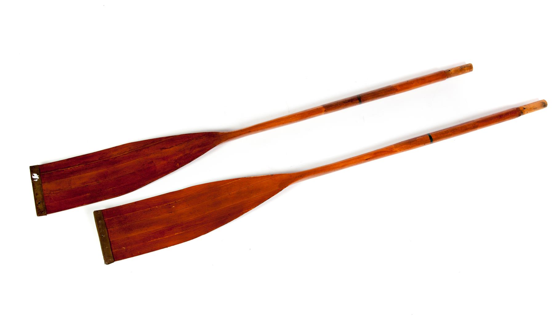 Appraisal: PAIR OF AMERICAN OARS Mid th century Laminated wooden oars