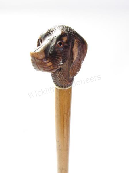 Appraisal: Articulated Wooden Dog Head Cane carved wood dog head handle