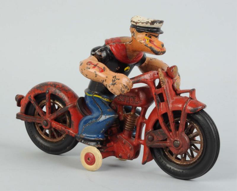 Appraisal: Hubley Cast Iron Popeye Patrol Motorcycle Toy Original figure marked