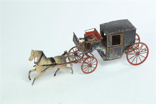 Appraisal: TIN TOY European mid th century Tin Victorian carriage and