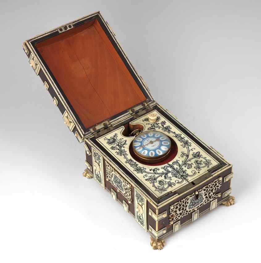 Appraisal: IVORY INLAID WATCH CASE WITH CHILD'S WATCH Tortoise shell over