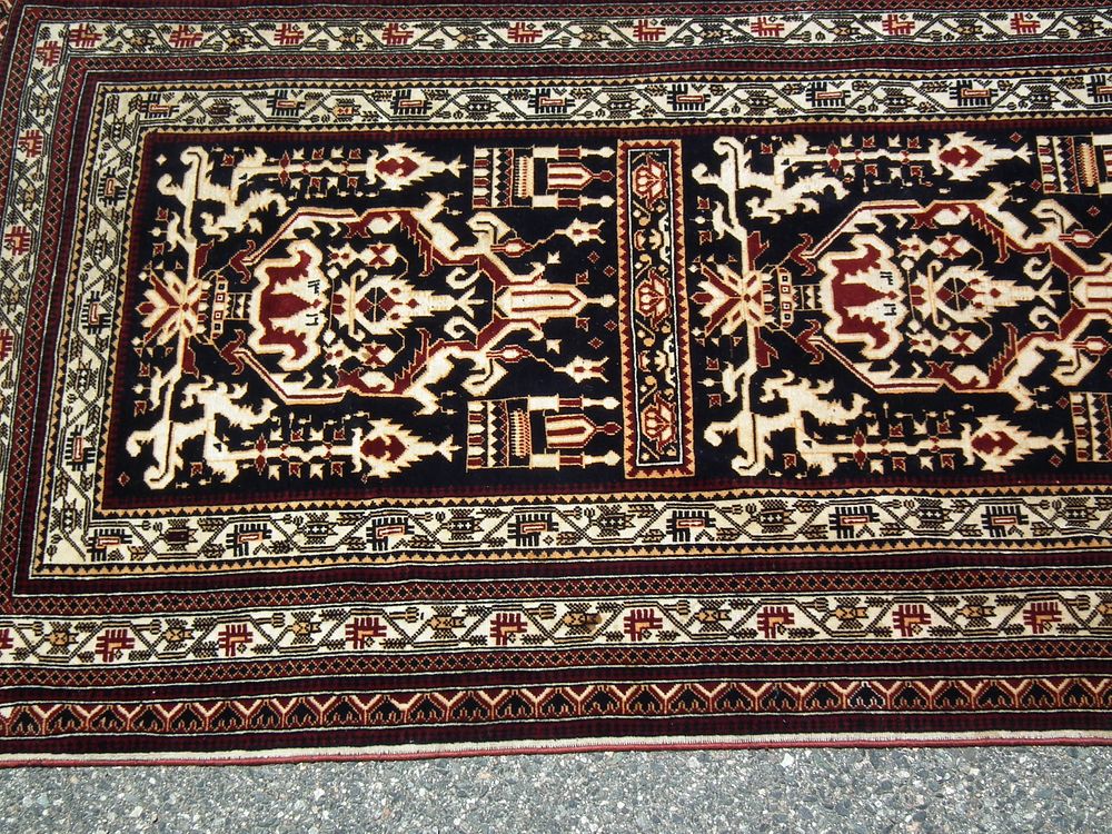 Appraisal: BELOUCHE SCATTER RUG Vintage Belouche scatter rug in black and