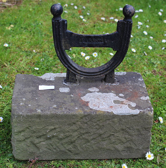 Appraisal: A VICTORIAN CAST IRON BOOT SCRAPER set into a stone