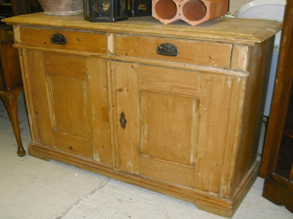 Appraisal: Late th century French pitch pine side cabinet the moulded