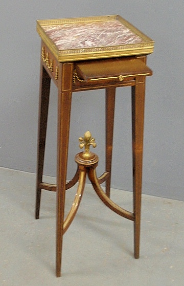 Appraisal: - French mahogany end table with marble and brass galleried