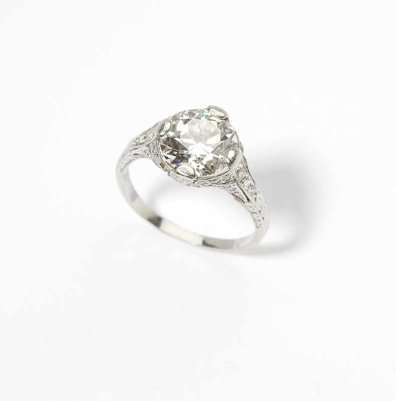 Appraisal: Circa platinum centering an old European-cut diamond weighing approximately cts