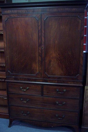 Appraisal: A George III mahogany linen press circa with two panelled