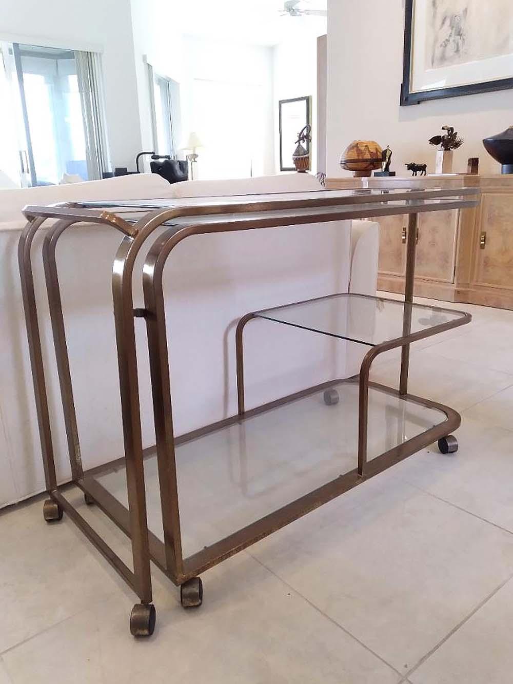 Appraisal: MODERNIST BRASS GLASS ADJUSTABLE BAR CARTCirca Rectangular in form with