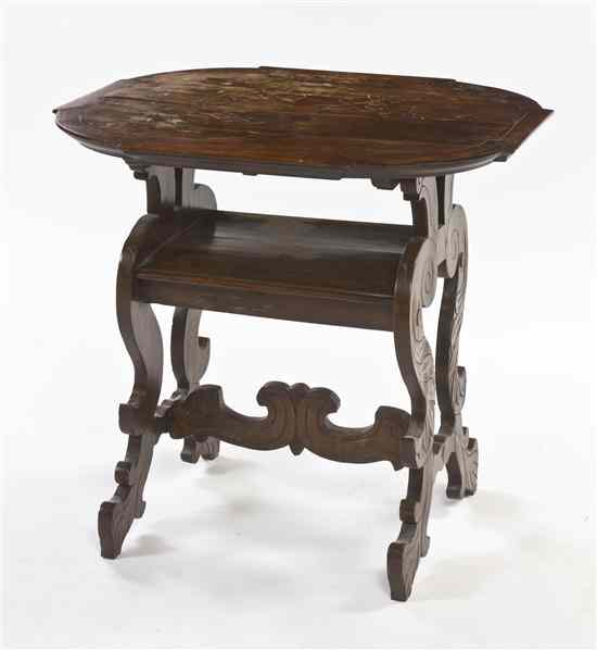 Appraisal: A Continental Marquetry Occasional Table the shaped oval top raised