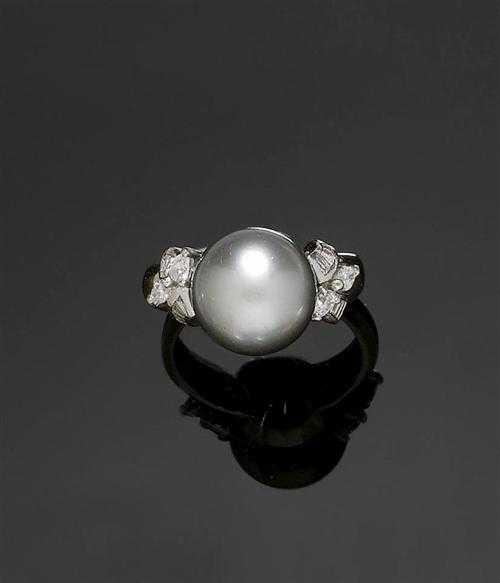 Appraisal: TAHITI PEARL AND DIAMOND RING AND CLIP EARRINGS White gold