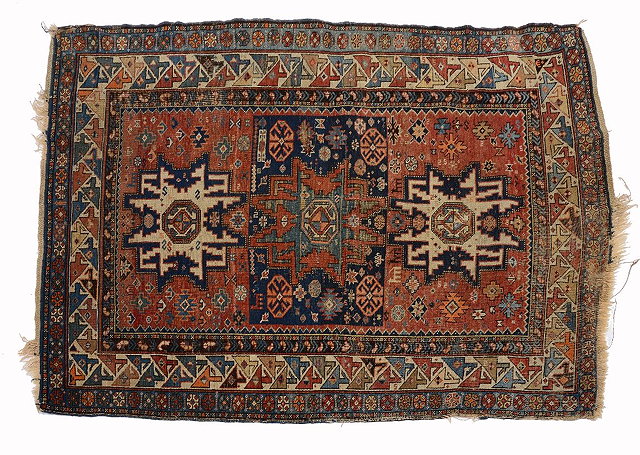 Appraisal: AN OLD KASAK RUG with triple star medallion within a