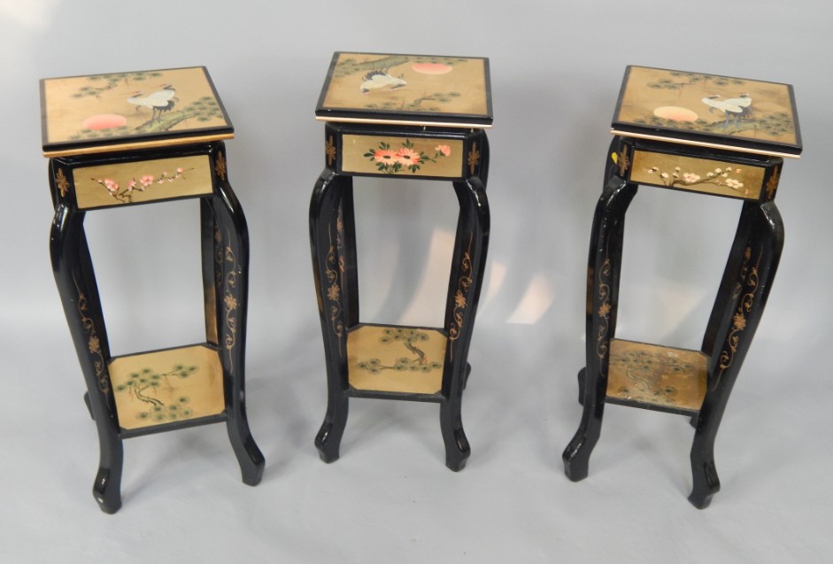 Appraisal: Three gilt and black lacquered square jardiniere stands decorated with