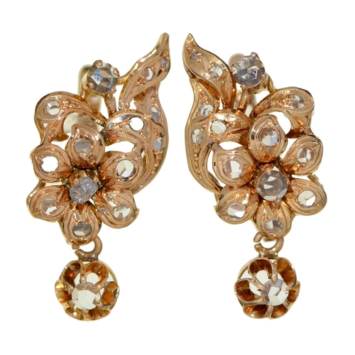 Appraisal: A pair of diamond earrings in the form of a