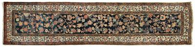 Appraisal: Hamadan runner repeating floral designs on blue black field ivory