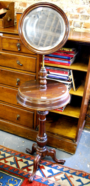 Appraisal: Late th century mahogany shaving stand having a circular adjustable