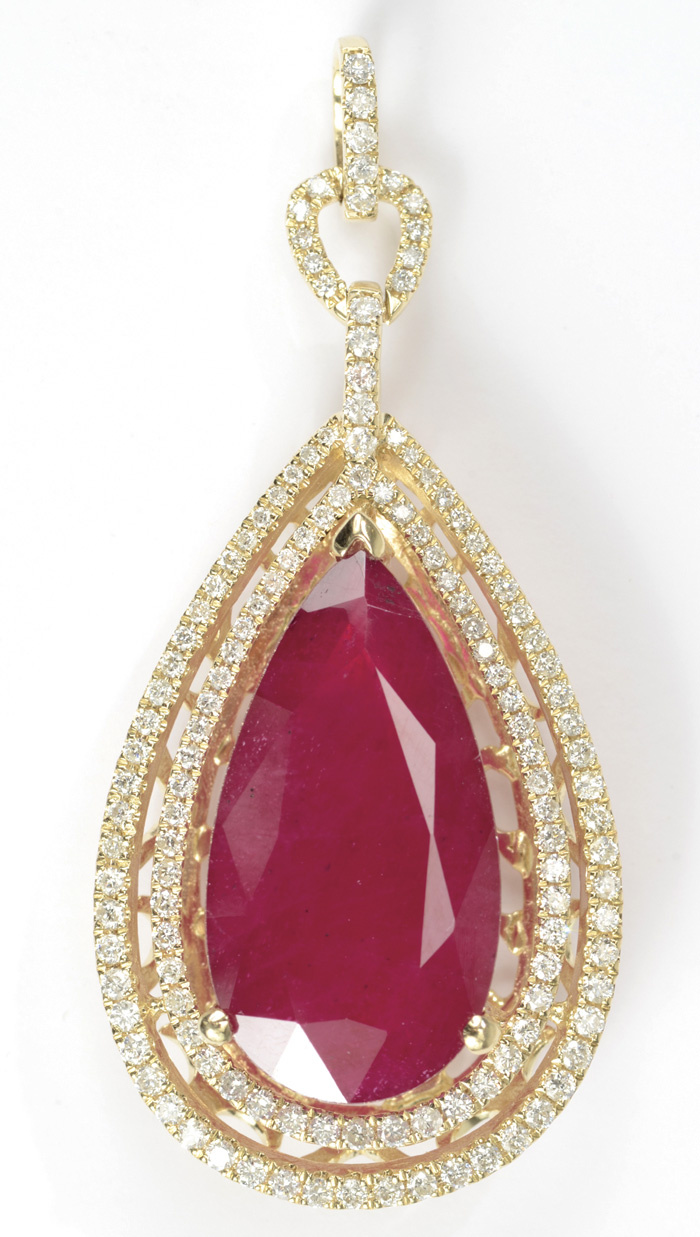 Appraisal: RUBY DIAMOND AND FOURTEEN KARAT GOLD PENDANT with round-cut diamonds