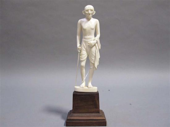 Appraisal: INDIAN CARVED IVORY FIGURE OF MAHATMA GHANDI th C On