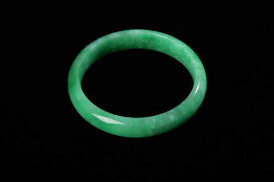 Appraisal: CHINESE APPLE GREEN JADEITE BANGLE - in long