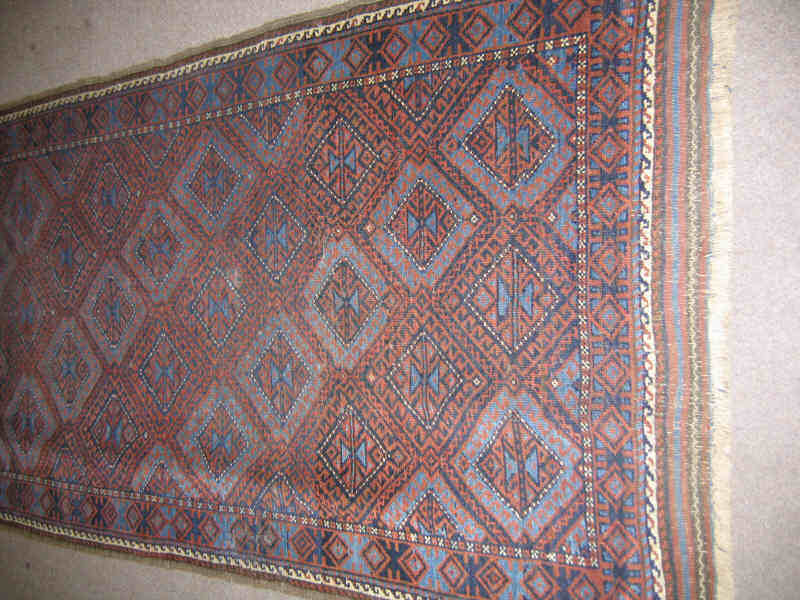 Appraisal: TURN OF THE CENTURY BALOUCH THROW RUG The salmon field