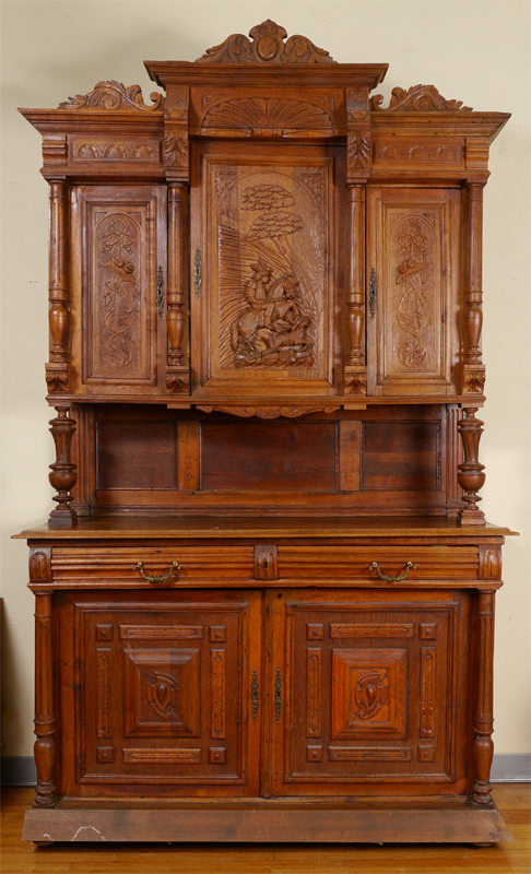 Appraisal: CONTINENTAL CARVED WALNUT COURT CUPBOARD Top with carved panel doors