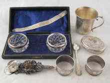 Appraisal: A mixed lot comprising two napkin rings a boxed pair