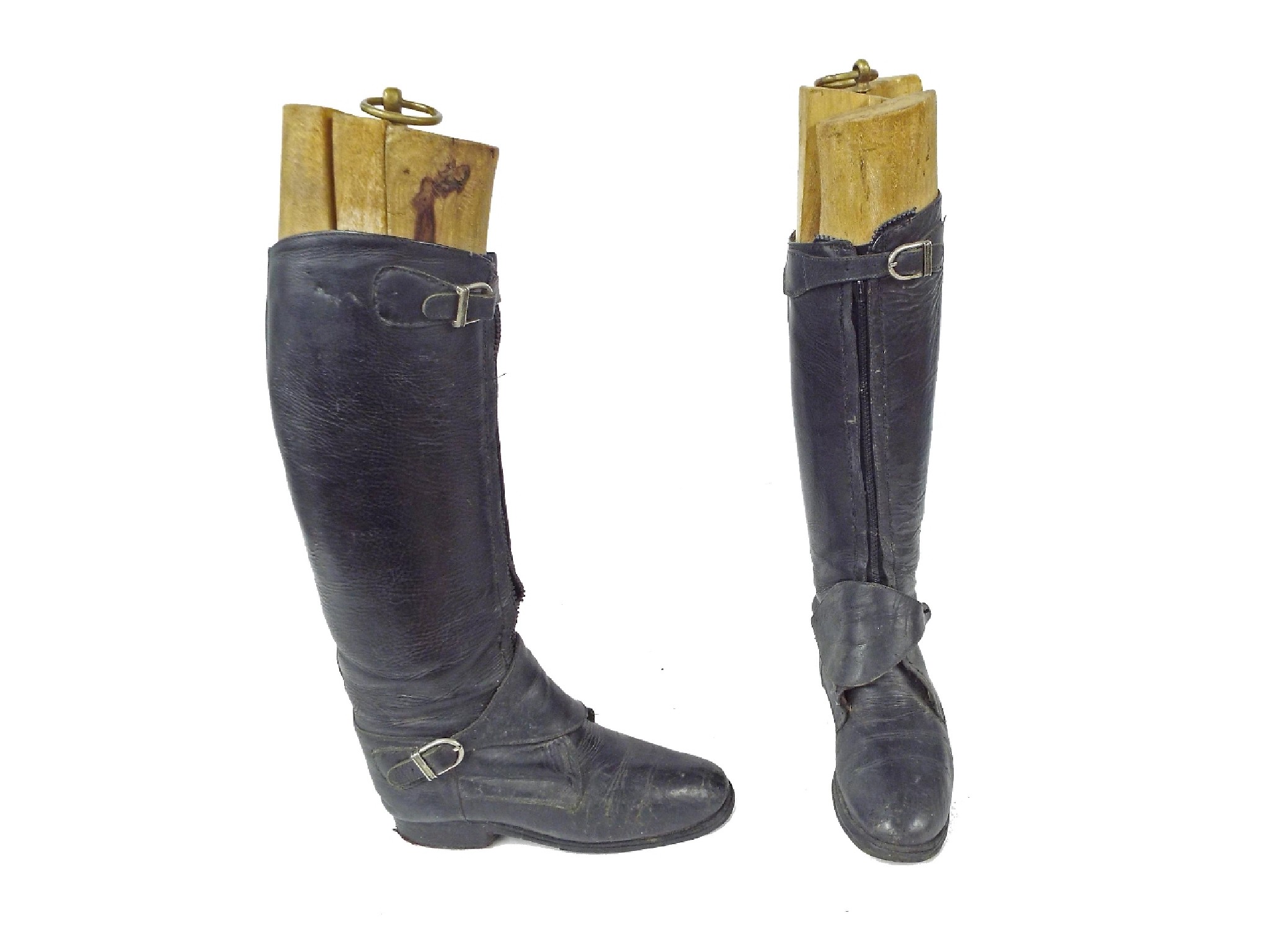 Appraisal: Pair of black leather riding boots with wooden inserts together