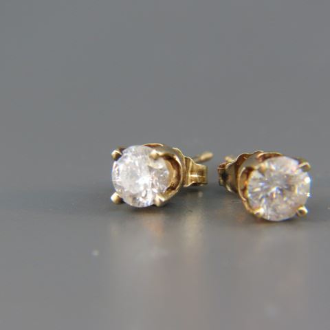 Appraisal: Diamond Stud Earrings carat round brilliant k yellow gold settings