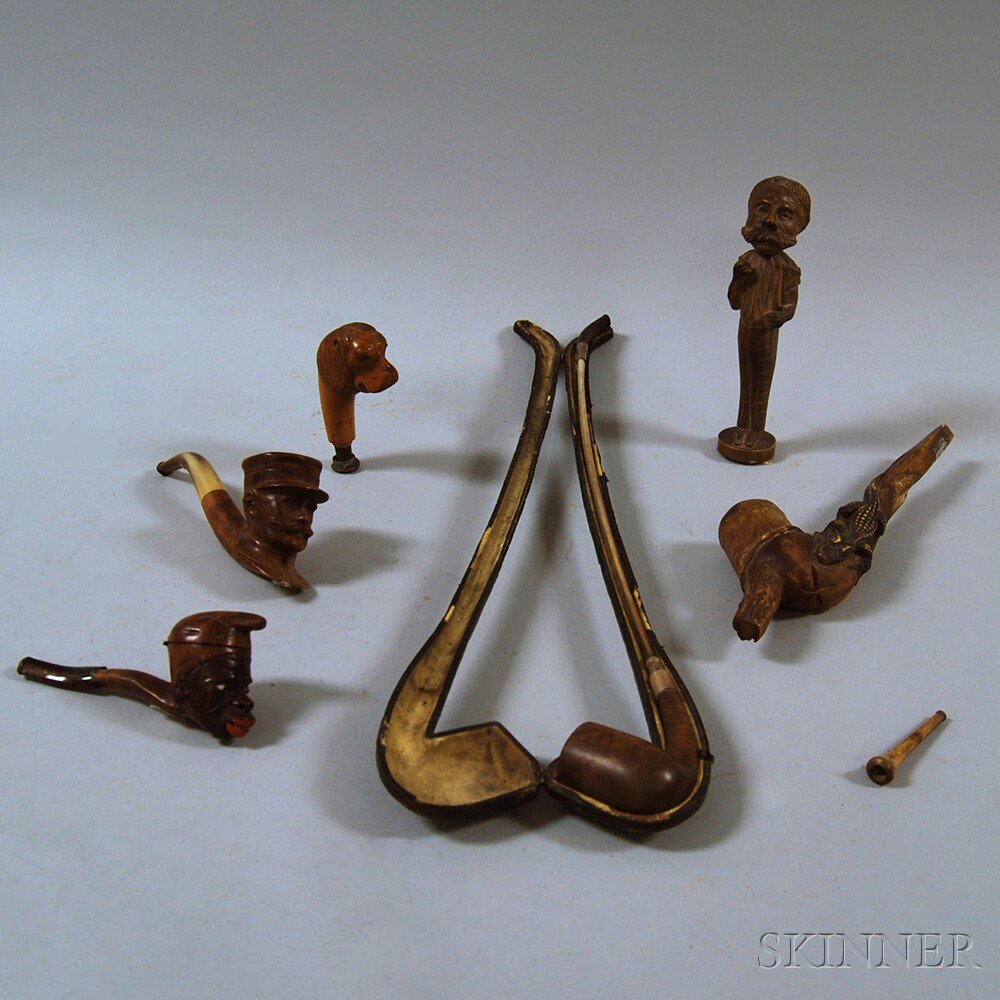 Appraisal: Group of Carved Pipes and Smoking Items including a burl