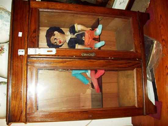 Appraisal: A TWO DOOR OAK DISPLAY CABINET