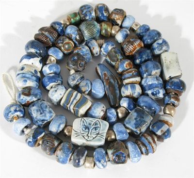 Appraisal: A Joan Sydenham bead necklace carved and painted beads glazed