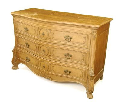 Appraisal: A th century continental oak serpentine commode with carved decoration