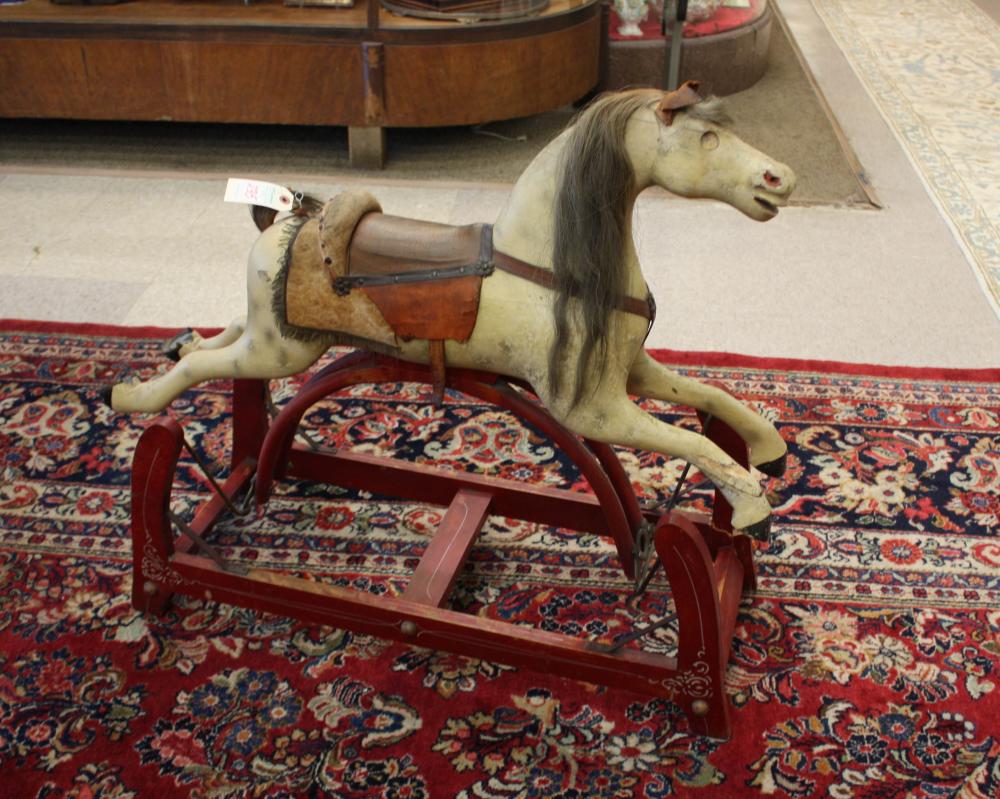 Appraisal: CHILD'S ANTIQUE ROCKING HOBBY HORSE American c painted wood with