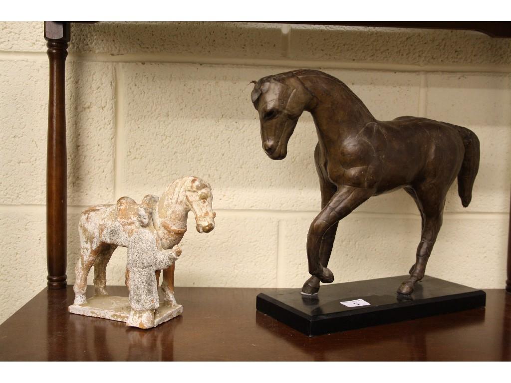 Appraisal: Interesting leather clad statue of a horse upon an ebonised