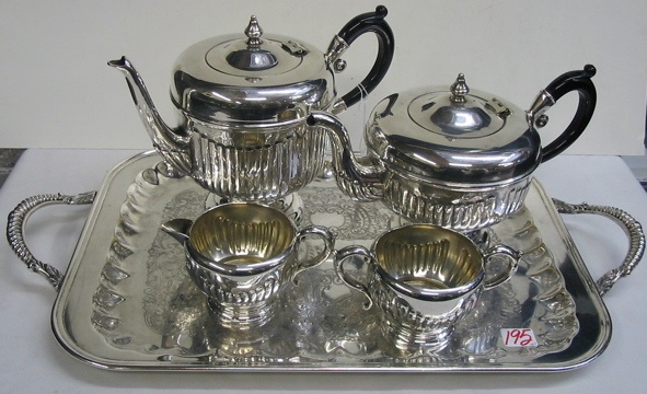 Appraisal: A CANADIAN PIECE SILVERPLATED TEA SET on a rectangular serving