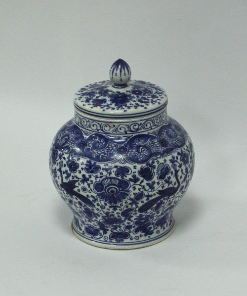 Appraisal: A pearlware blue and white jar and cover decorated in