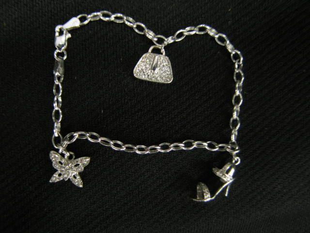 Appraisal: Diamond Charm Bracelet trio of charms k white gold