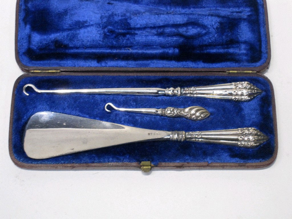 Appraisal: Cased silver handled buttonhook and shoehorn set Birmingham