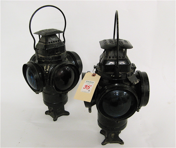 Appraisal: A PAIR OF FOUR-WAY RAILROAD SWITCH LAMP LANTERNS The Adlake