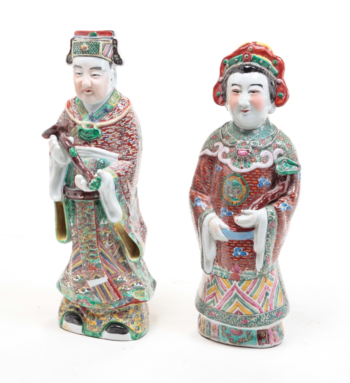 Appraisal: Late th century Standing robed figures holding ruyi scepters Impressed