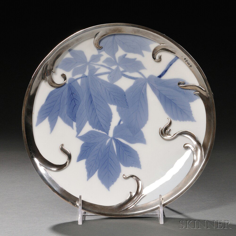 Appraisal: Royal Copenhagen Sterling Silver-mounted Porcelain Chestnut Dish Denmark c decorated