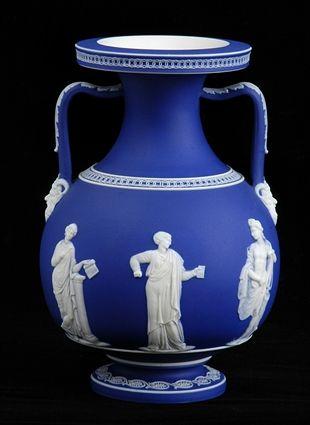 Appraisal: WEDGWOOD BLUE JASPERWARE TWO-HANDLED VASE Impressed Wedgwood over W and