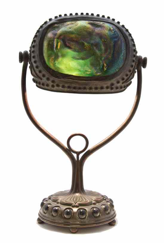 Appraisal: A Tiffany Studios Bronze and Favrile Glass Desk Lamp the