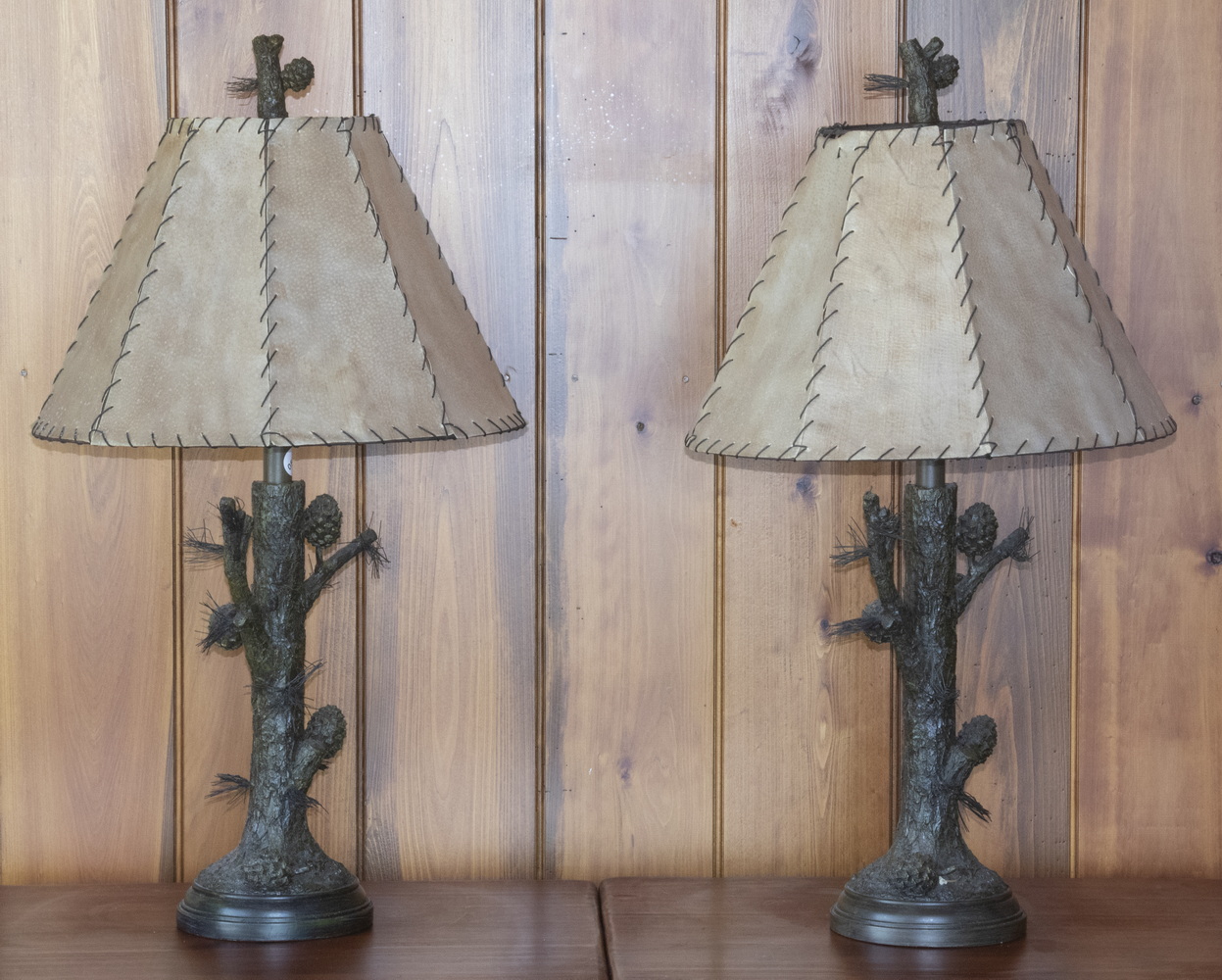 Appraisal: PR QUOIZEL TABLE LAMPS Pair of Pine Tree Form Lamps