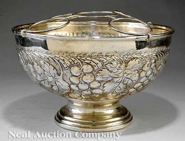 Appraisal: A Mexican Silverplate Punch Bowl th c grapeleaf repouss stepped