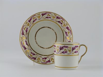 Appraisal: A Pinxton coffee can and saucer painted with a wide